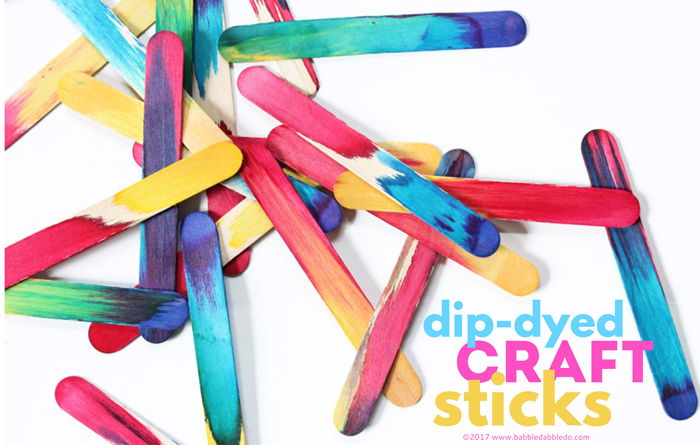 Simple Science Art Idea: Make gorgeous dip-dyed craft sticks and explore color mixing and absorption!