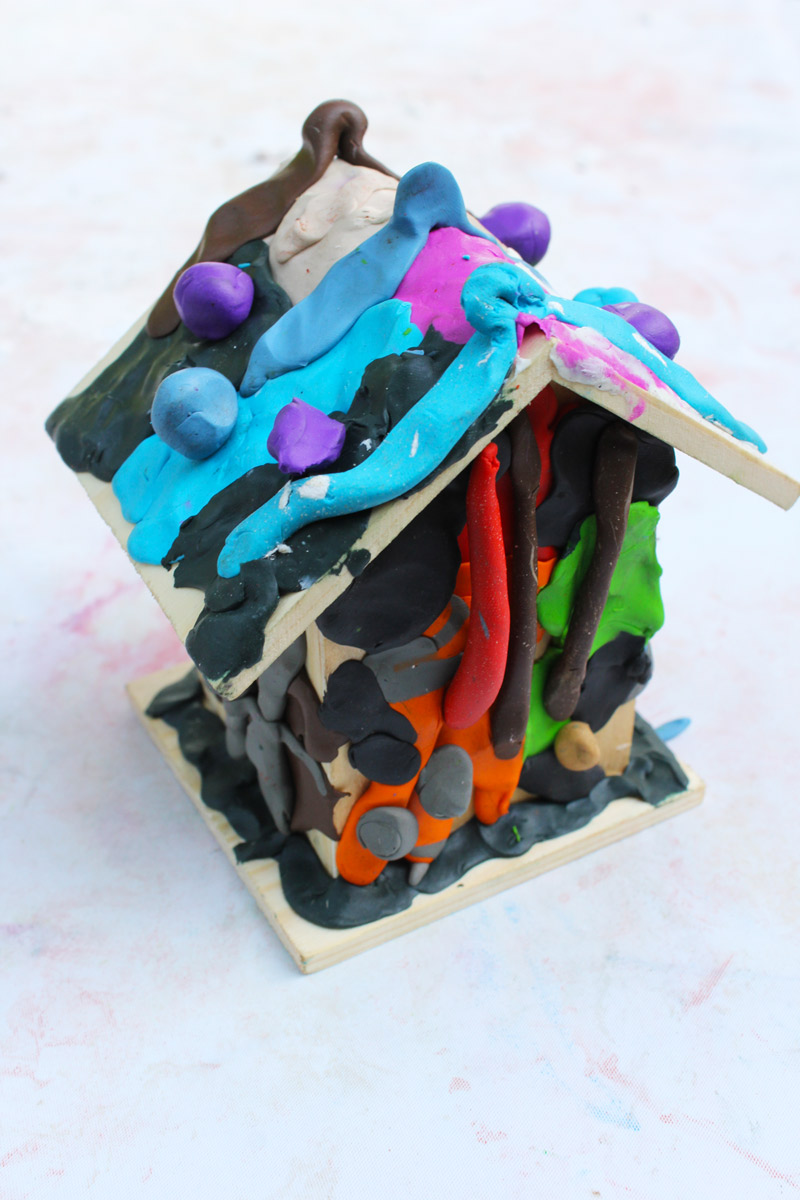 Art projects for kids: Use colored clay to decorate inexpensive wood birdhouses!