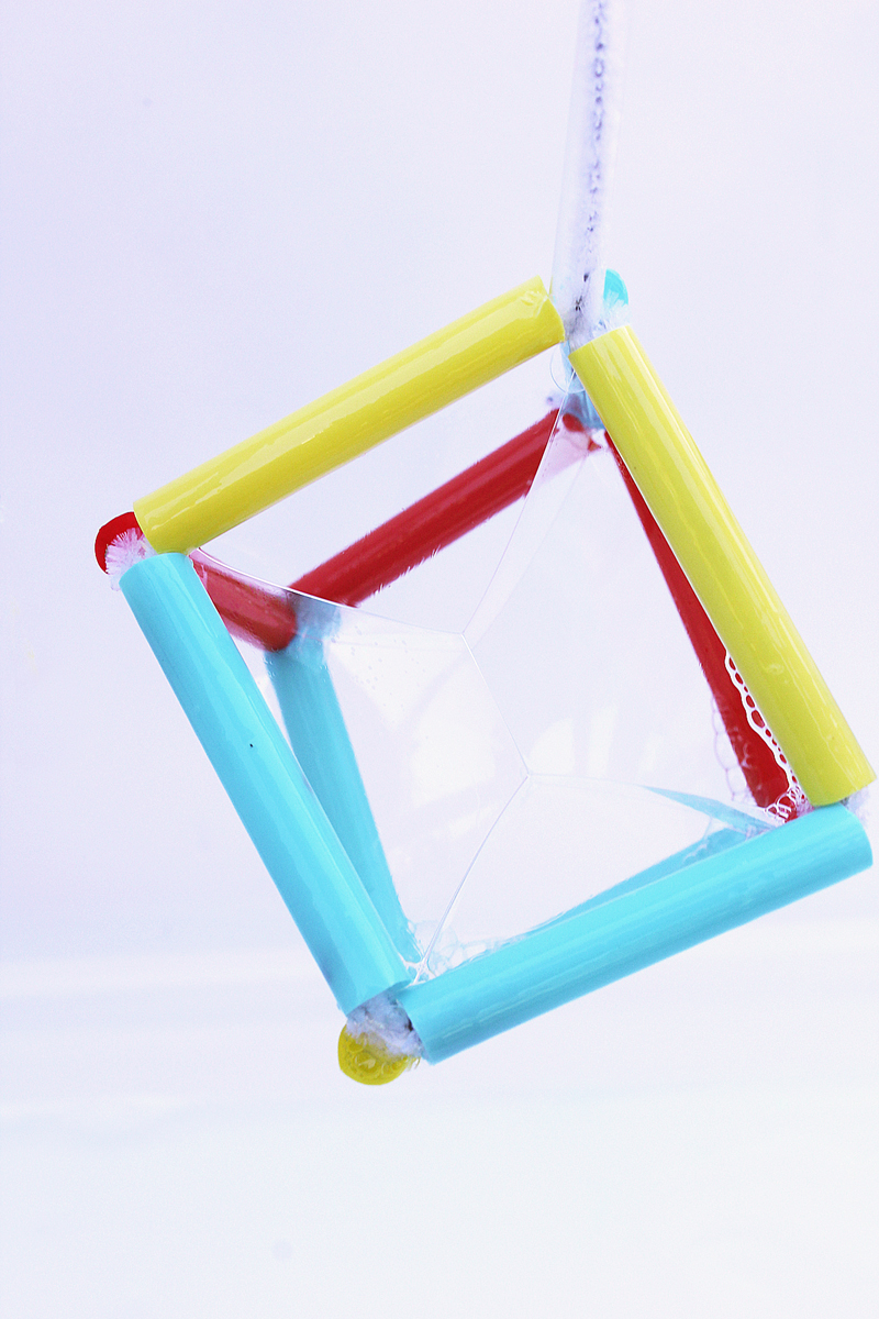STEM Project: Make geometric bubbles that mimic tensile structures. Great engineering project for kids!