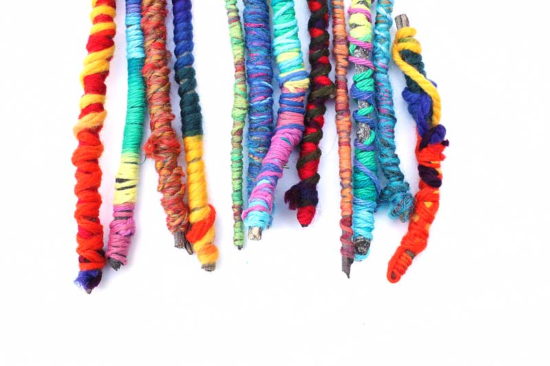 Easy Crafts for Kids: Yarn Sticks. Make them as a standalone craft or for use in other projects.
