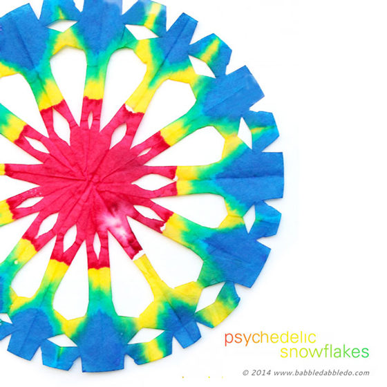 Colorful Snowflake Craft Idea: Make a Psychedelic Snowflake out of a coffee filter.