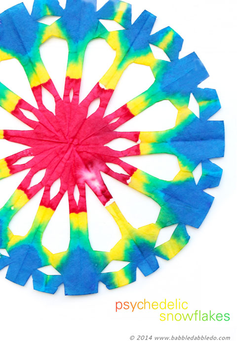 Colorful Snowflake Craft Idea: Make a Psychedelic Snowflake out of a coffee filter.