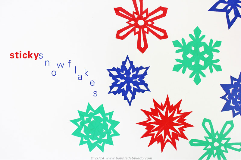 Make "sticky" snowflakes using contact paper. Fun idea for DIY wall and window clings.
