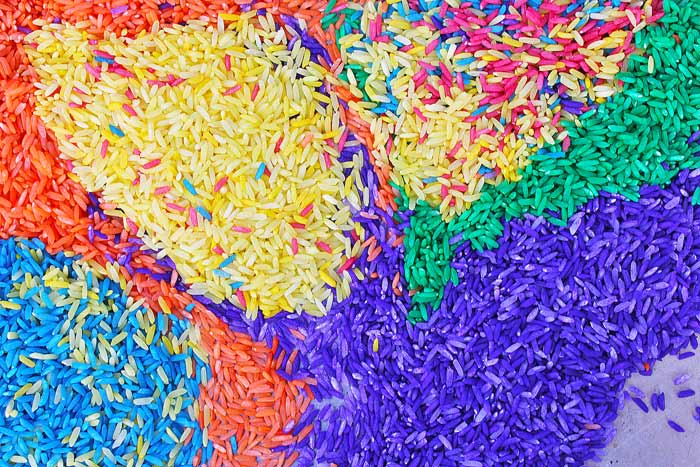 Sensory Play Ideas: Make Confetti Rice inspired by the "150+ Screen-Free Activities for Kids" book from Fun At Home With Kids