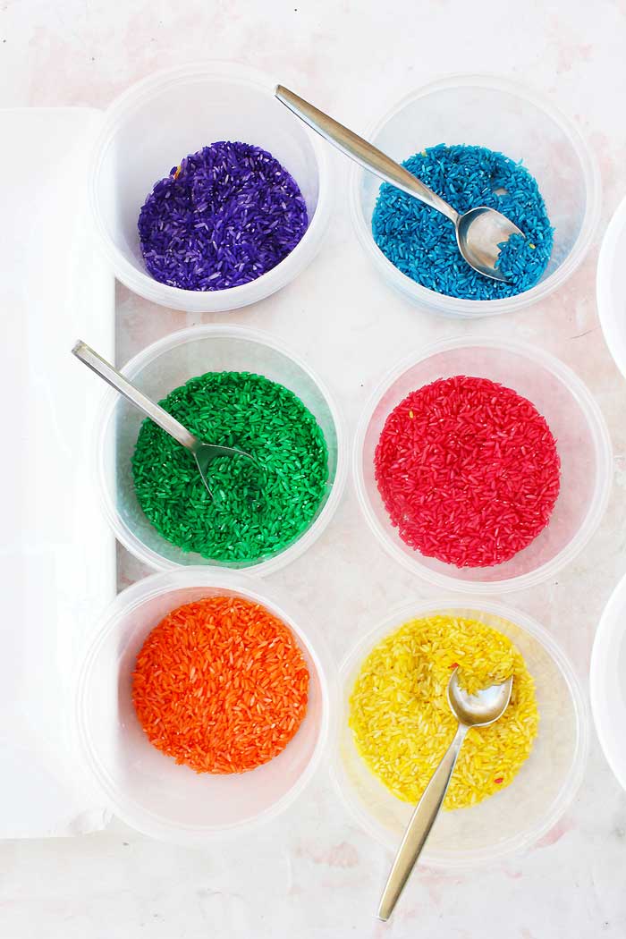 Sensory Play Ideas: Make Confetti Rice inspired by the "150+ Screen-Free Activities for Kids" book from Fun At Home With Kids