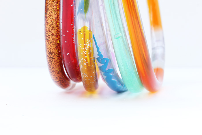 Science Project Idea: Make Discovery Tubes and explore three different scientific concepts in one colorful DIY toy!