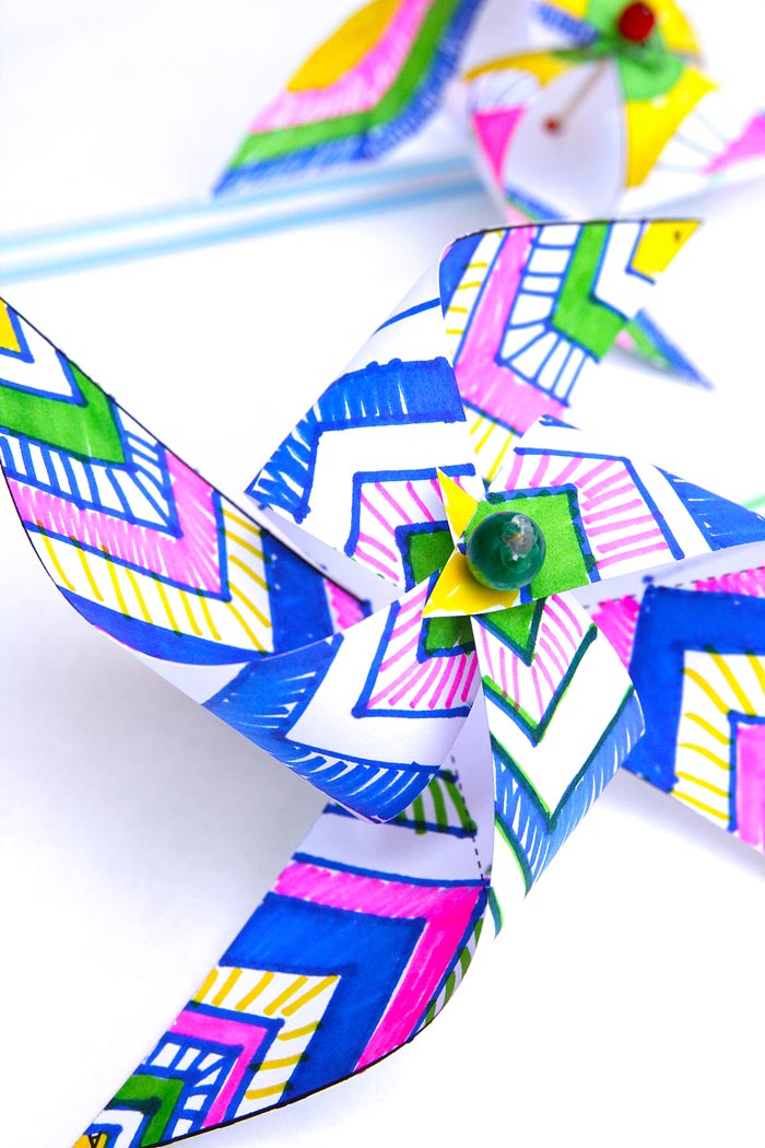 Easy kids paper crafts: Decorate and make your own op-art pinwheels. Template included in post.