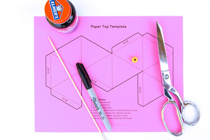 Make these simple printable paper toys at home: Paper Tops! Easy for even young kids to spin!