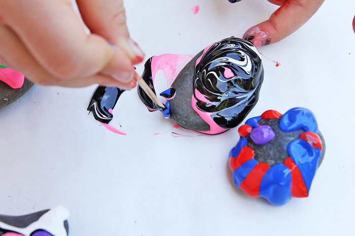 Puffy Painted Rocks: A classic craft with a twist! Use Puffy Paint to give rocks a rubbery texture and create bold, bright designs.