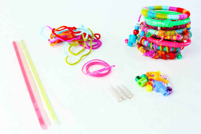 Upcycle used glow sticks into fancy DIY bracelets; no one will ever guess there is an old glow stick underneath!