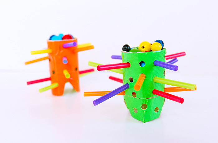 TP roll craft idea: Transform a cardboard tube into this easy to make DIY game inspired by the classic Kerplunk.