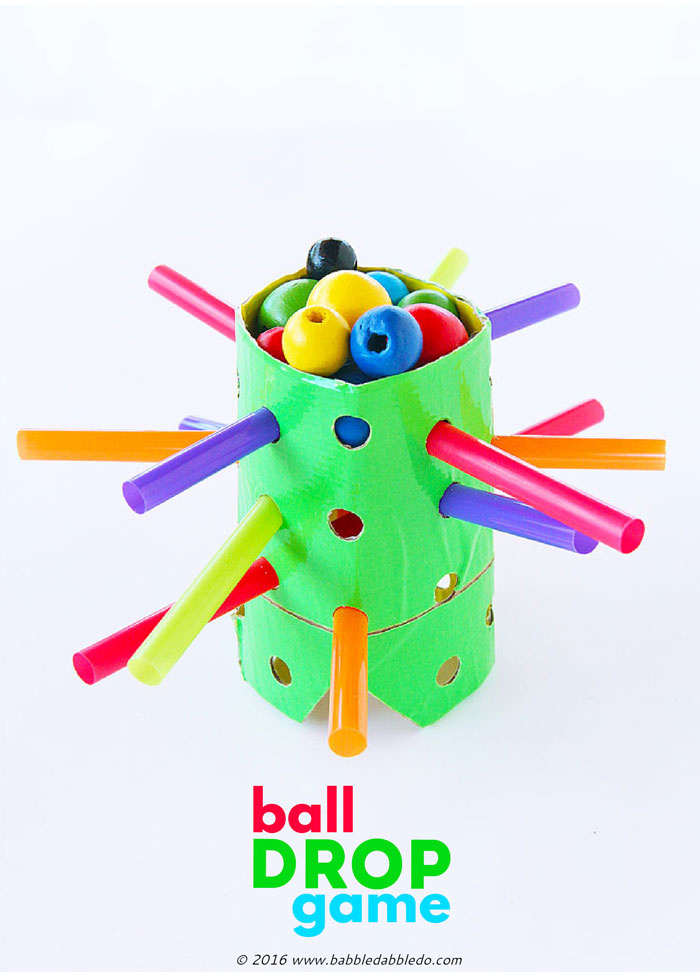 TP roll craft idea: Transform a cardboard tube into this easy to make DIY game inspired by the classic Kerplunk. 