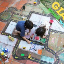 Collaborate with your kids in making a GIANT small world in your backyard for hours of creativity and play.