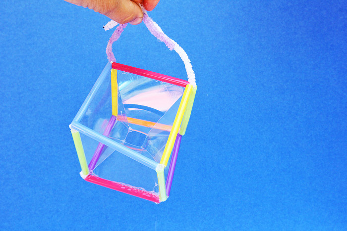 Learn how to make a square bubble that mimics tensile structures. This bubble cube can also be made in other geometric shapes!