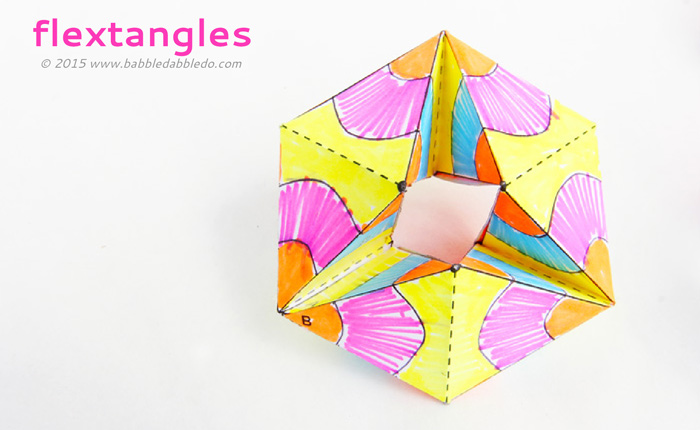 Make this paper toy and be mesmerized by the colorful action! Based on flexagons and kaliedocycles.