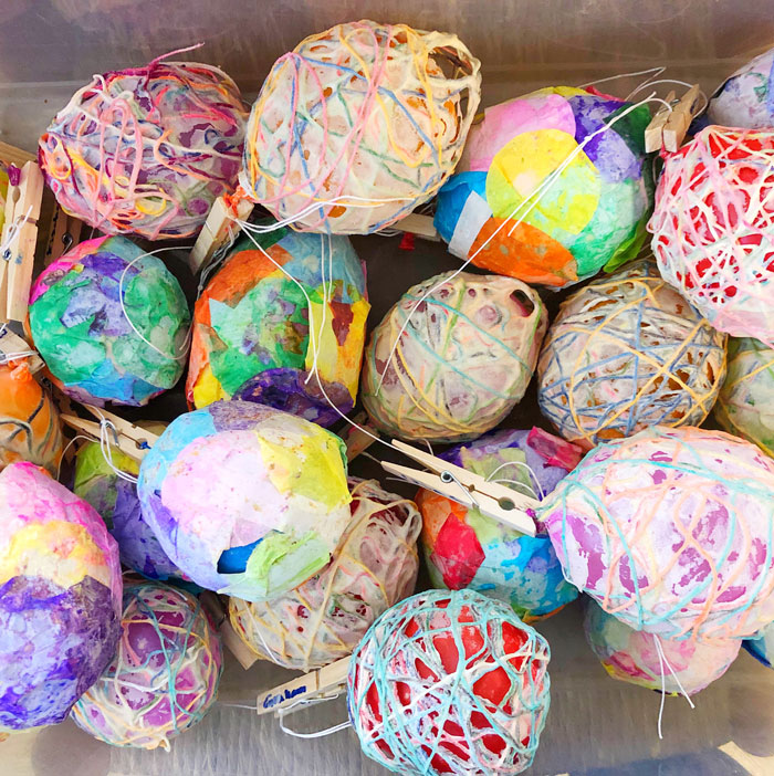 Learn how to make a decorative string ball using a homemade flour paste. These make beautiful holiday decorations for Easter, Christmas and more! 
